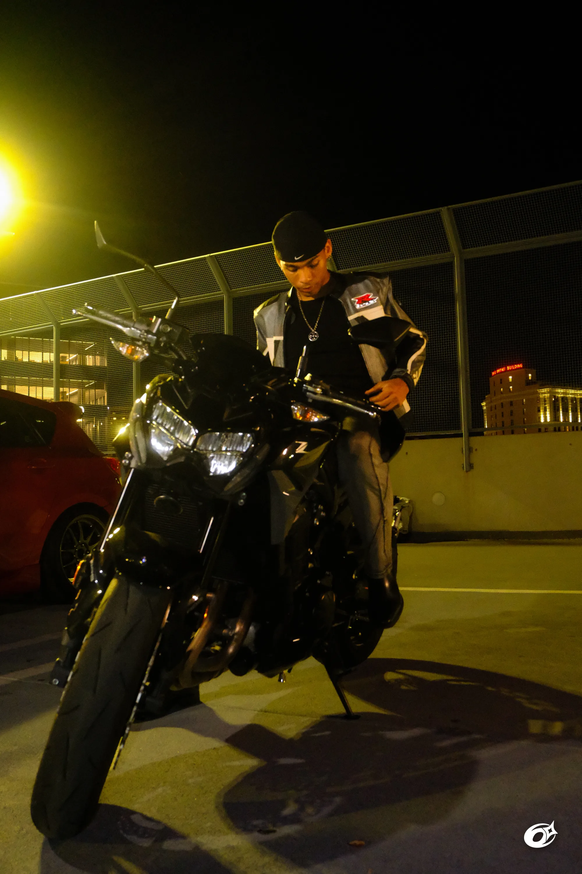Meekel posed with a motorcycle