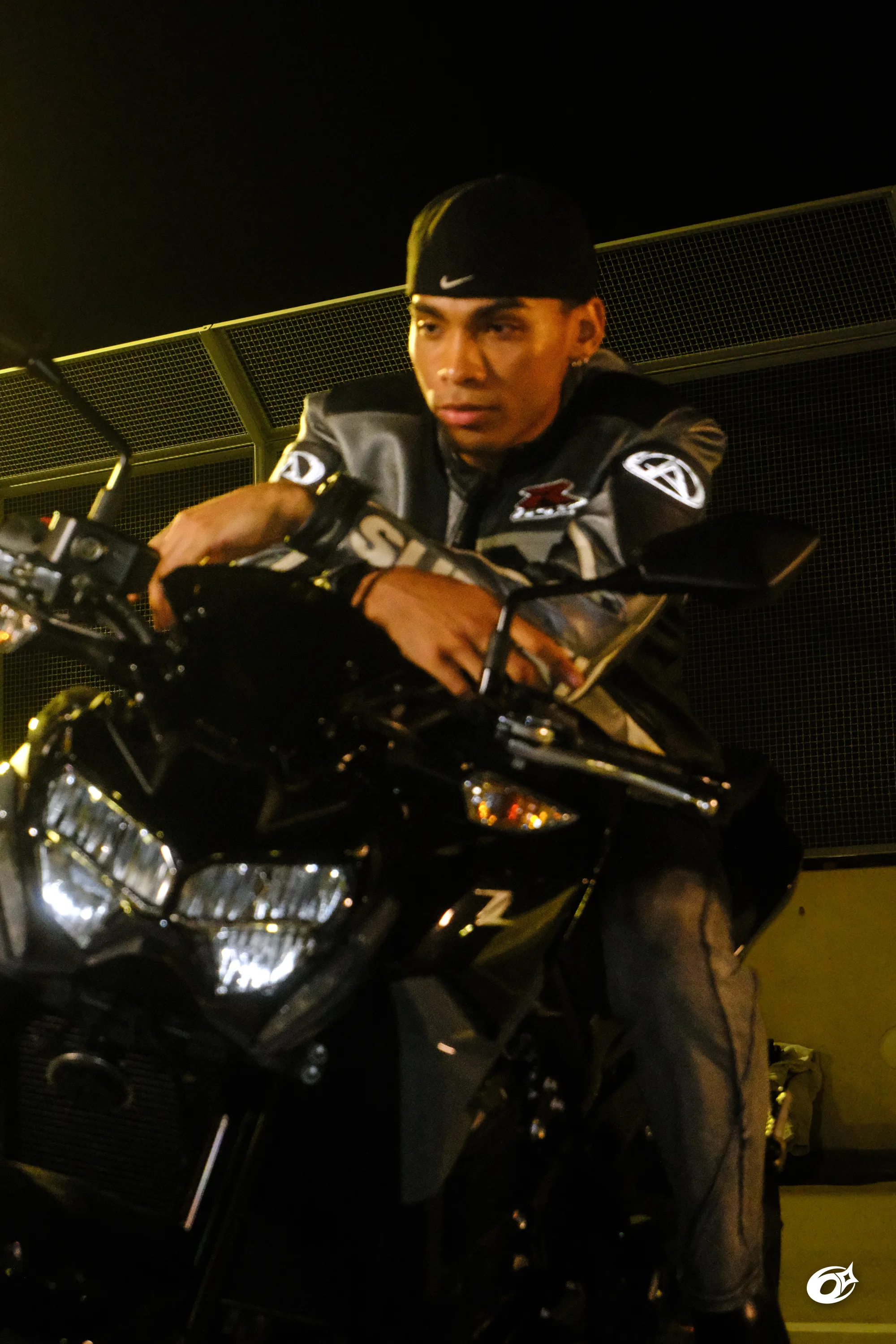 Close portrait beside a motorcycle